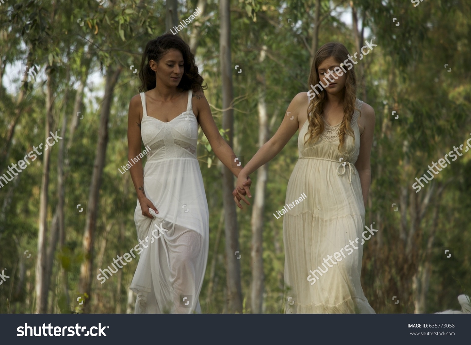 Two Girls White Dresses Holding Hands Stock Photo (Edit Now) 635773058