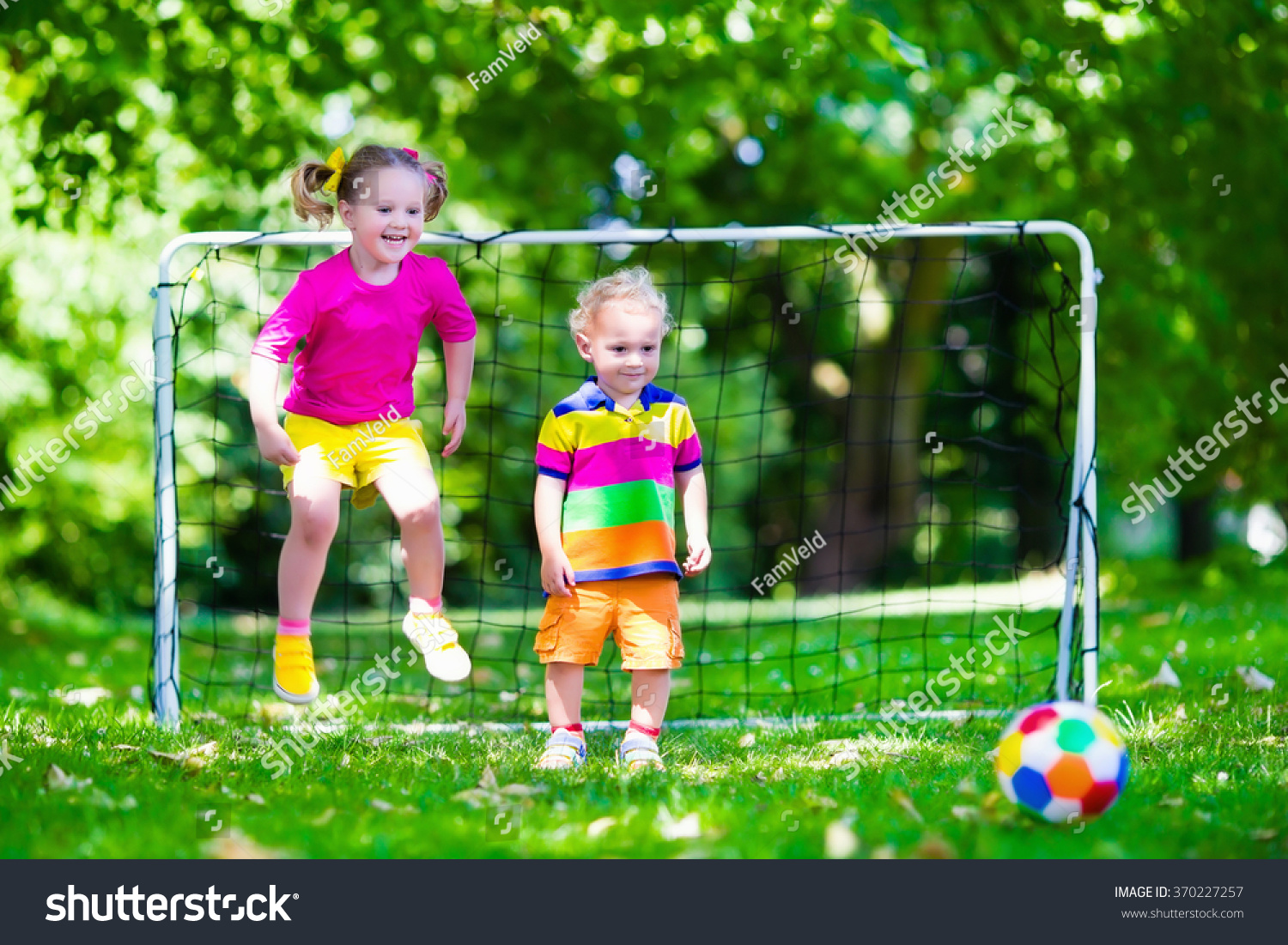 Two Happy Children Playing European Football Stock Photo 370227257 ...