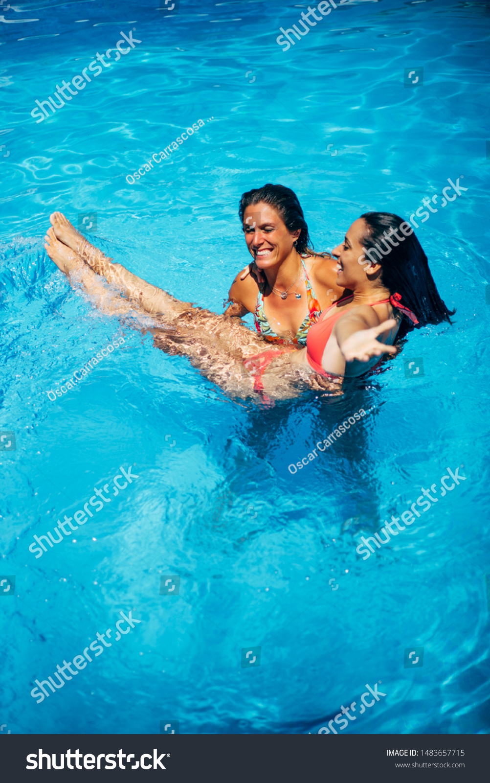 two lezzies having fun in water