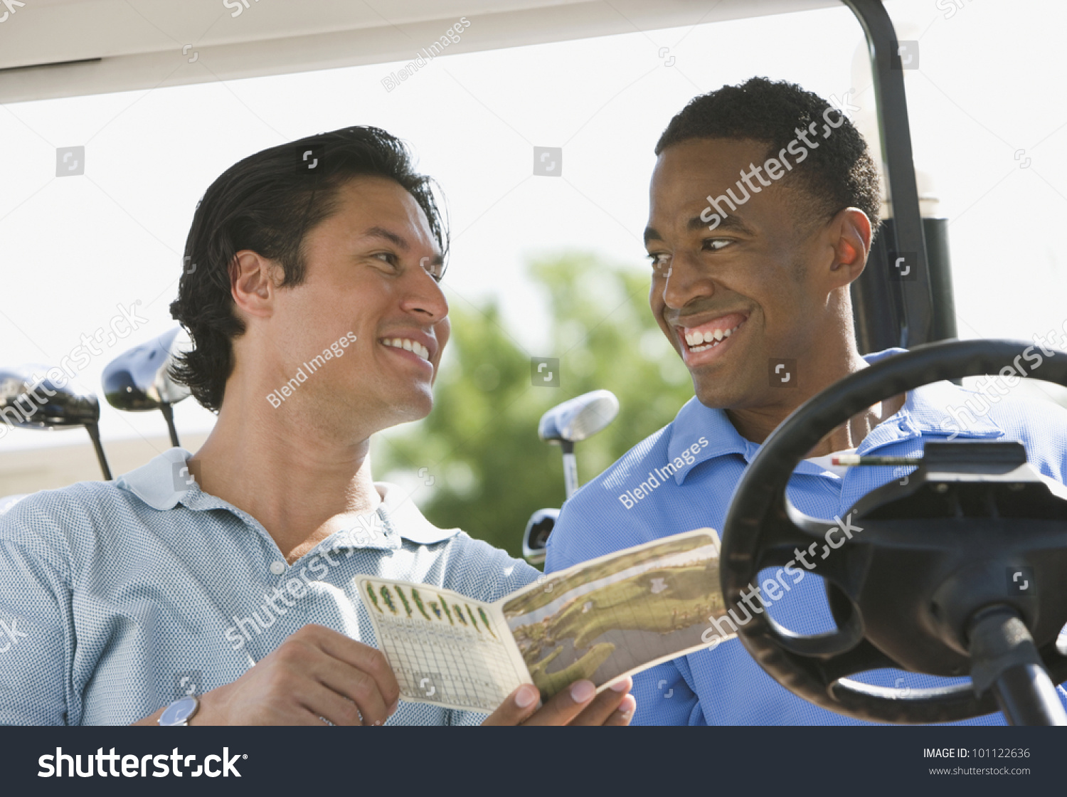 Two Men Smiling At Each Other In Golf Cart Stock Photo 101122636 ...