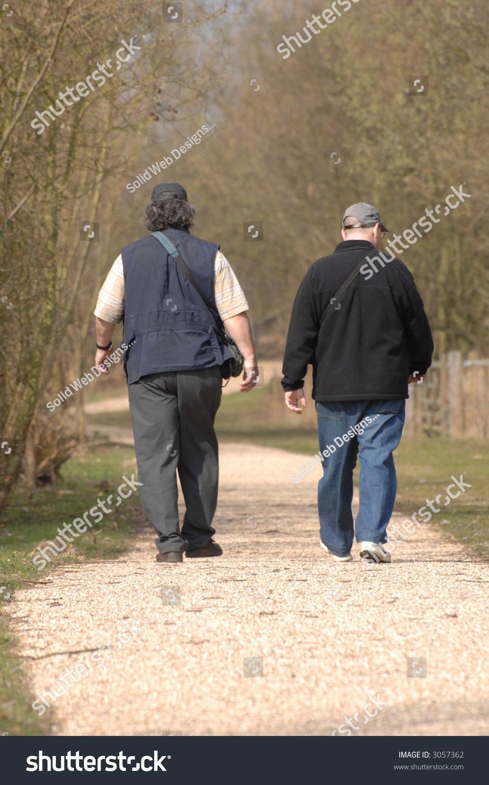 Two Men Walking Away View Along Stock Photo 3057362 - Shutterstock