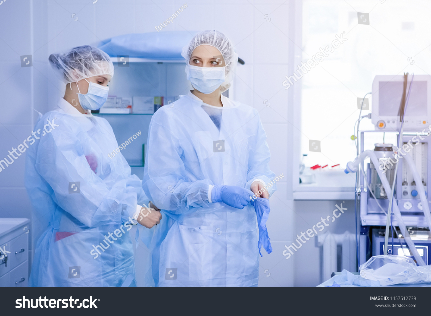 Two Nurses Preparing Surgery Operating Room Stock Photo