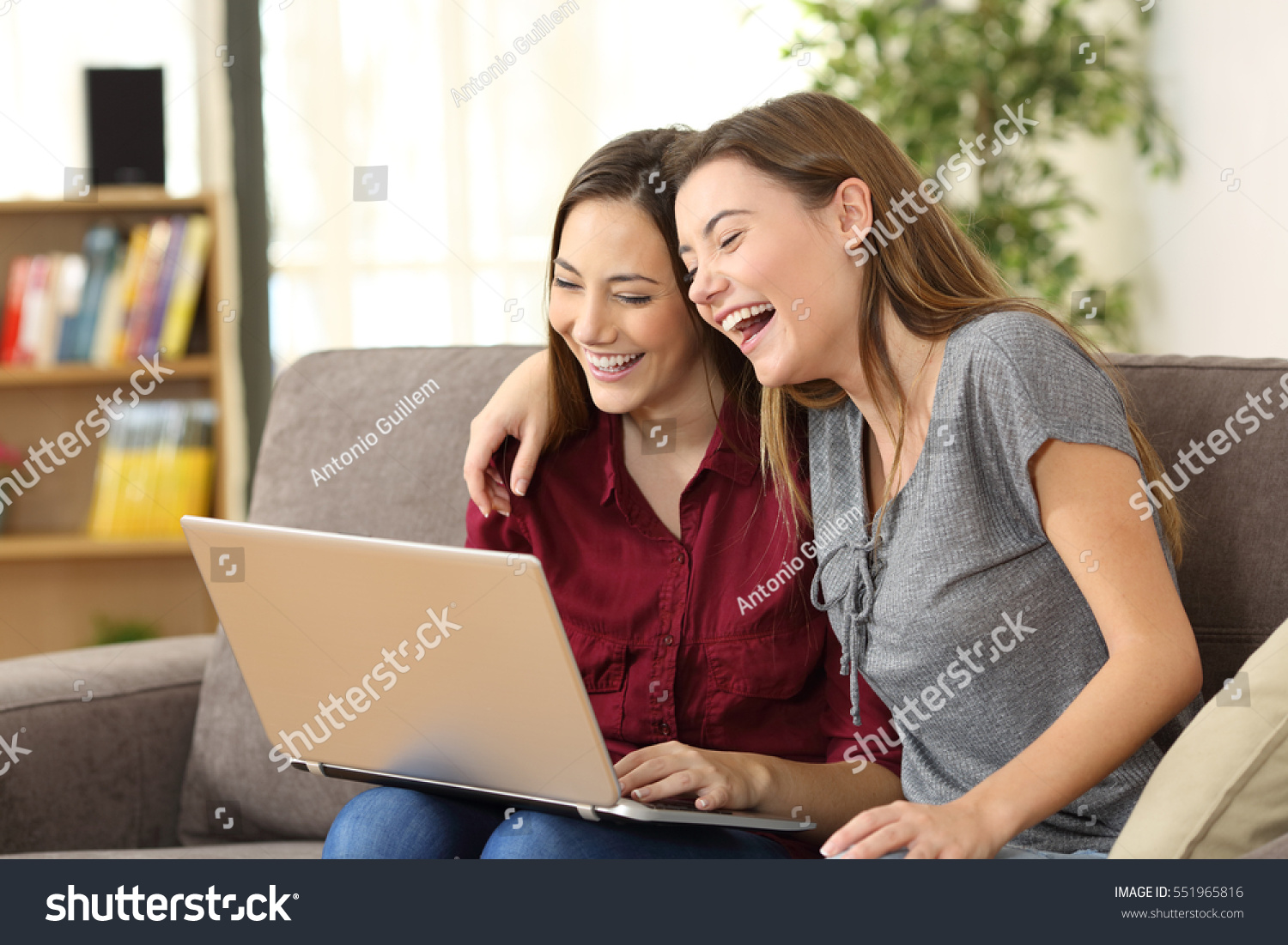 Two Playful Roommates Watching Videos On Stock Photo (Edit Now) 551965816