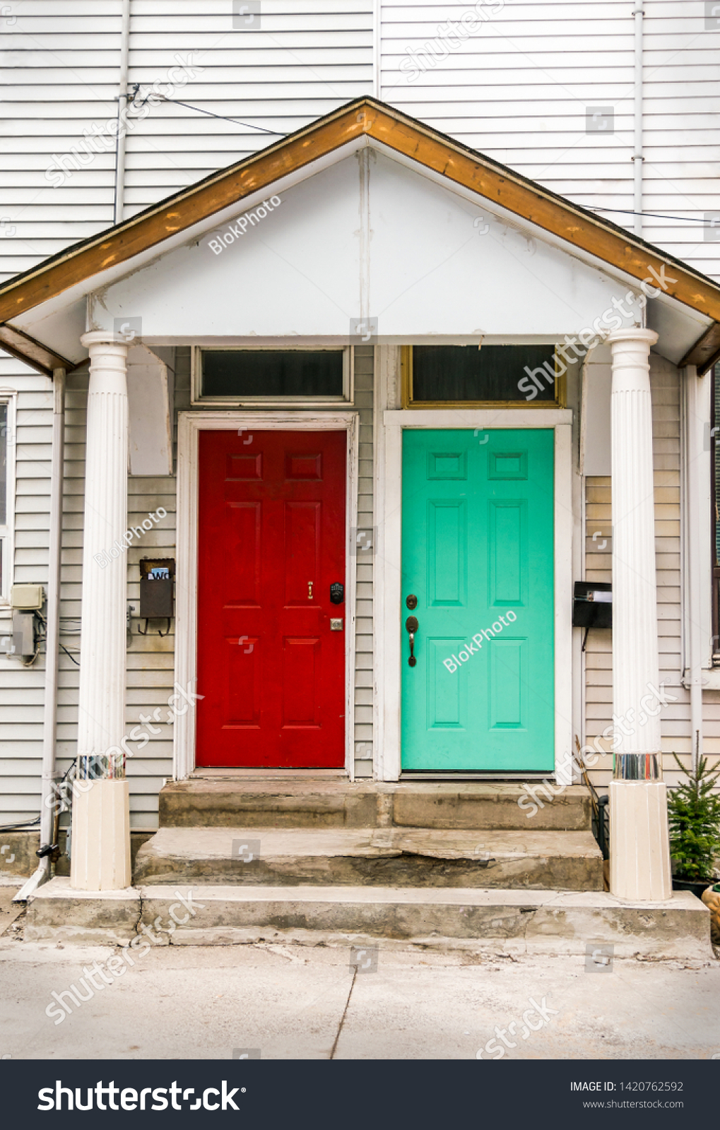 Two Residential Front Doors One Red Stock Photo Edit Now 1420762592