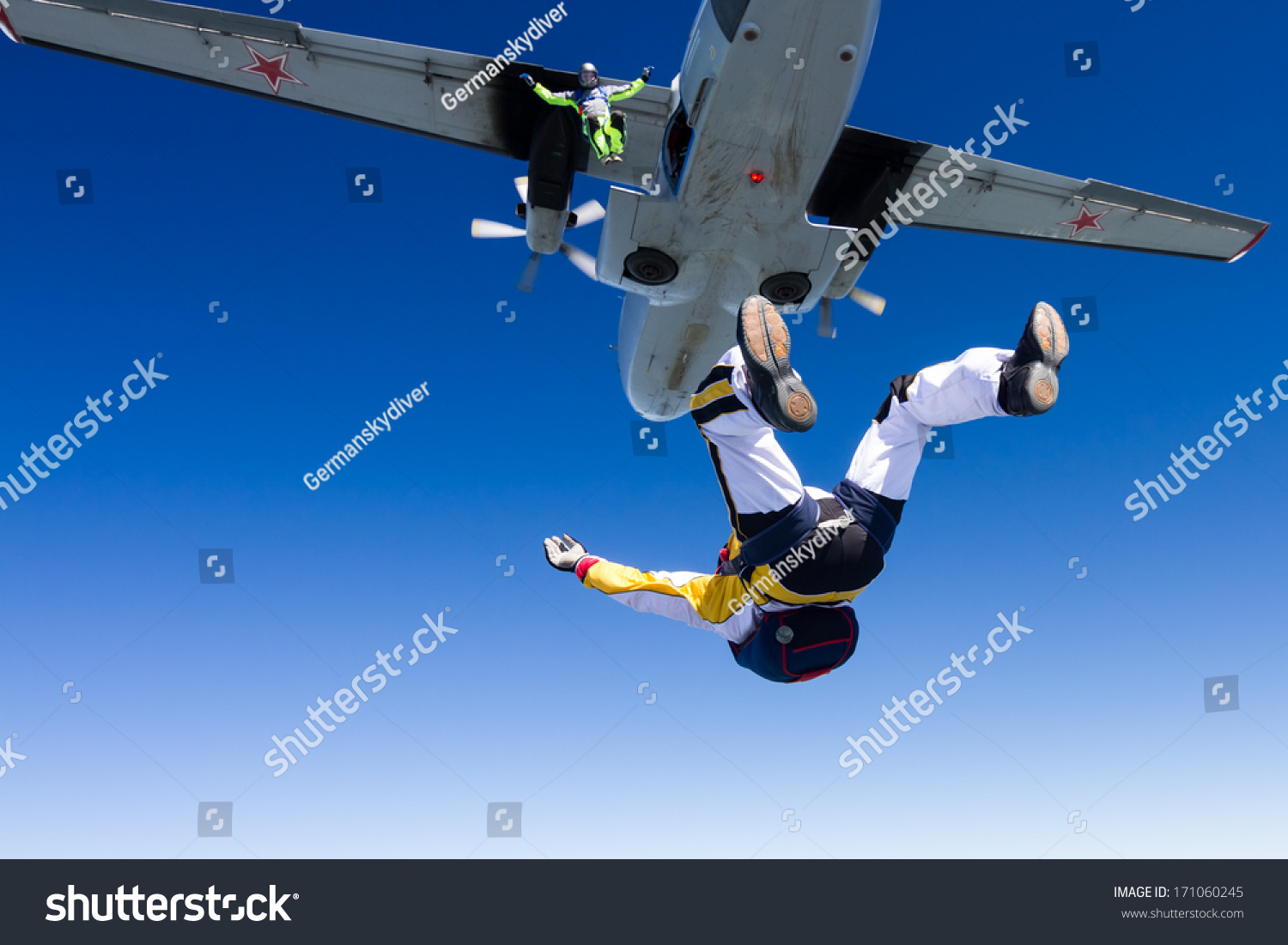 Two Skydivers Jump Out Airplane Stock Photo 171060245 - Shutterstock