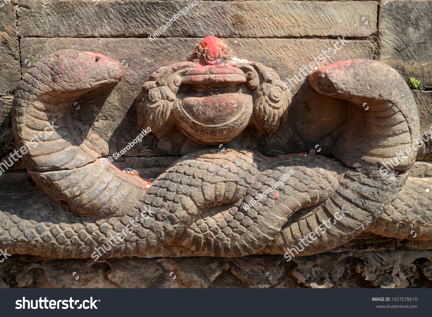 Two Stone Snakes Facing Each Other Stock Photo Edit Now