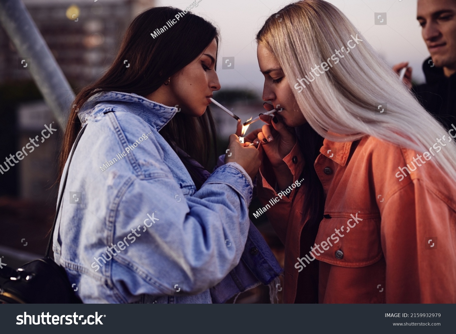 Two Teenage Girls Lighting Cigarettes Smoking Stock Photo 2159932979 ...