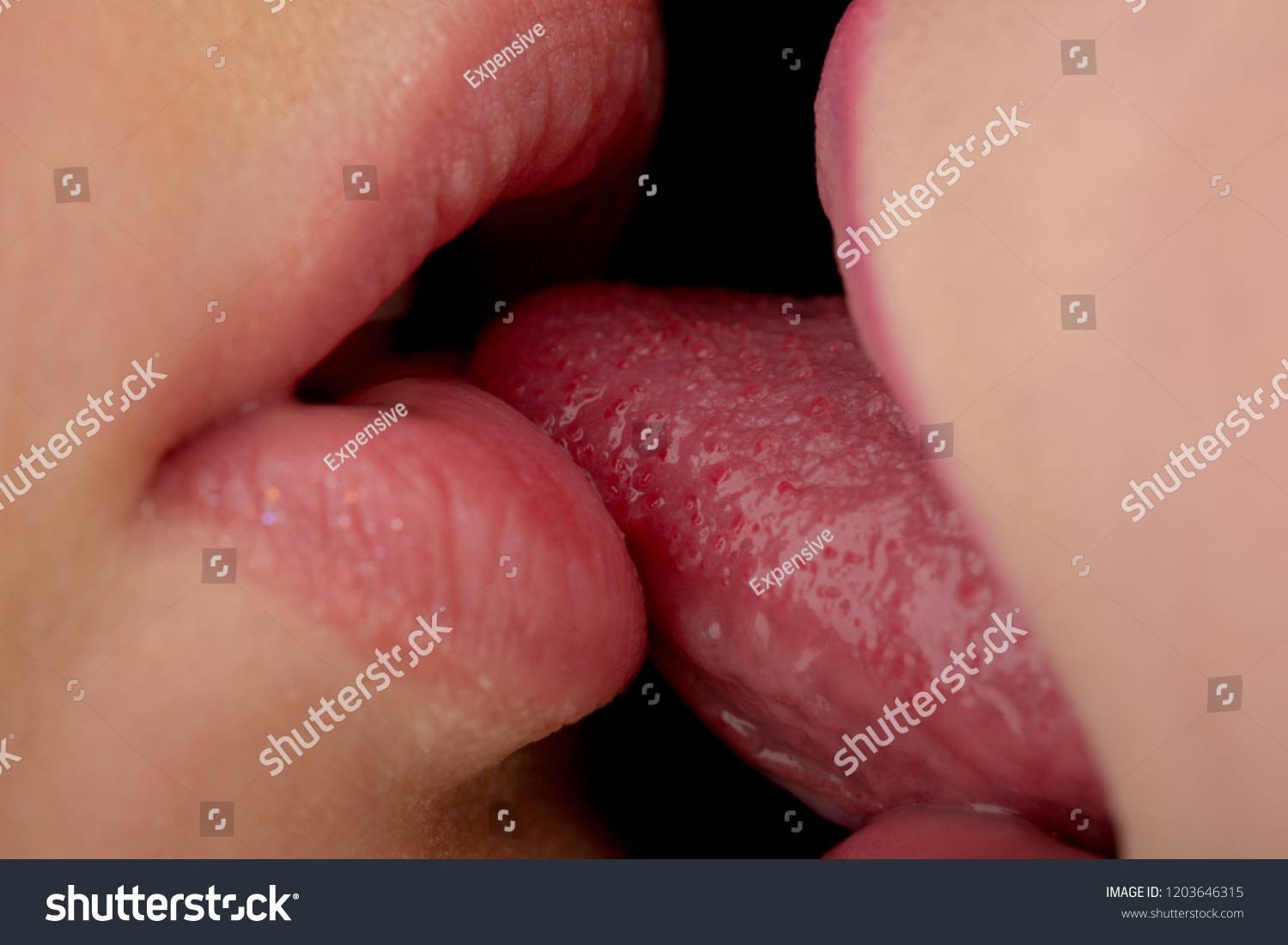 lesbians wet tongue kissing