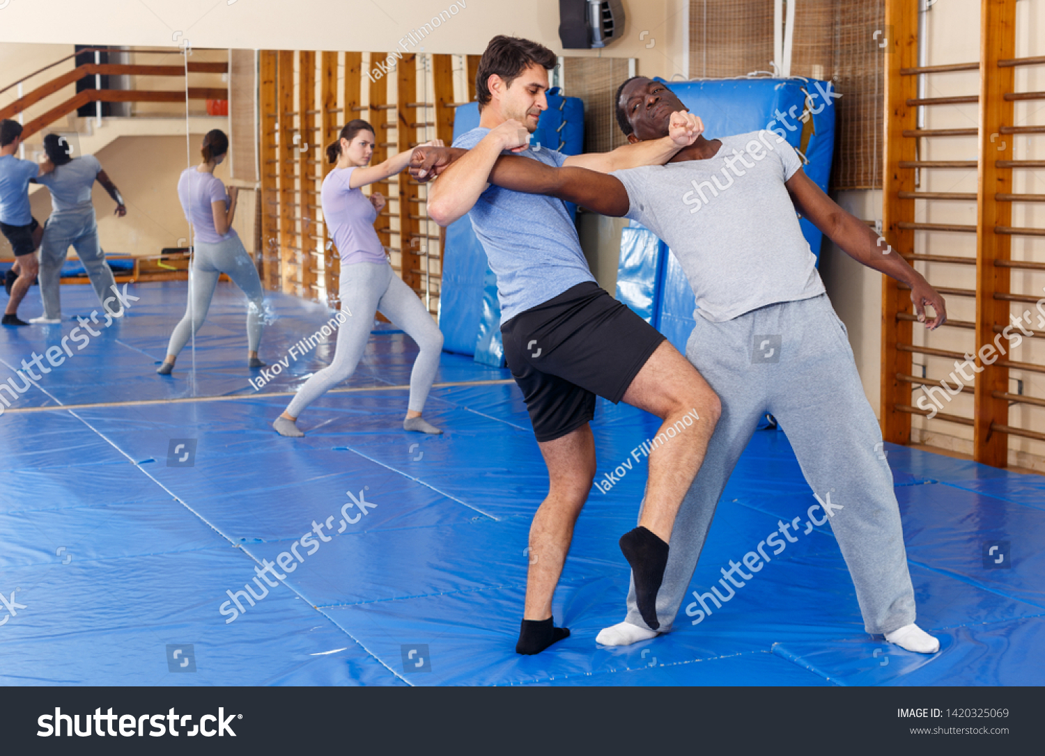 Two Young Men Practicing Self Defense Stock Photo Edit Now