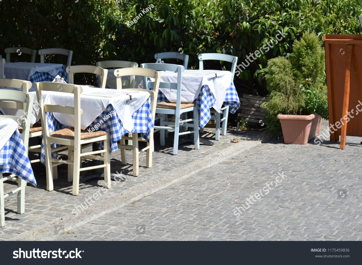Typical outdoor tables and chairs of a restaurant in athens greece