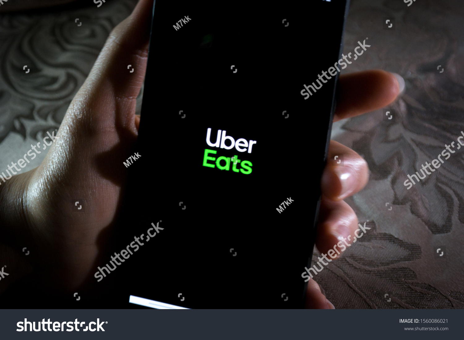 Uber Eats App Girl Using Ubereats 庫存照片(立刻編輯) 1560086021