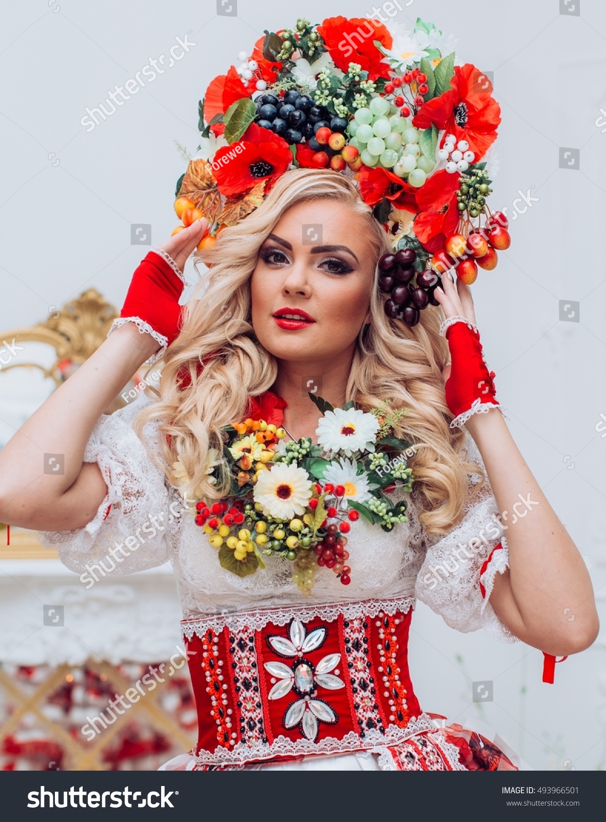https://image.shutterstock.com/z/stock-photo-ukrainian-beautiful-woman-in-national-clothes-493966501.jpg