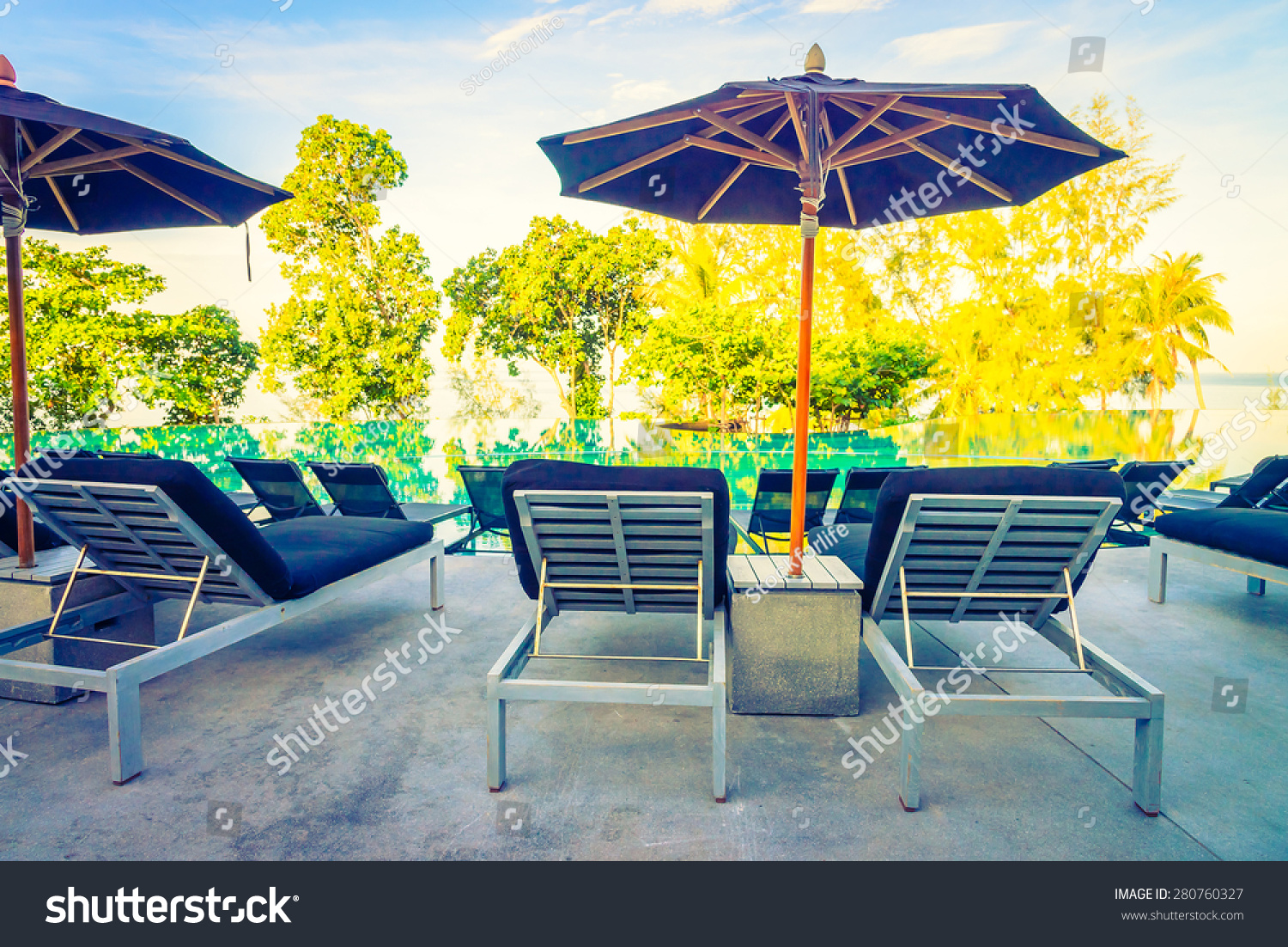 Umbrella Pool Chair Vintage Filter Sunflare Stock Photo