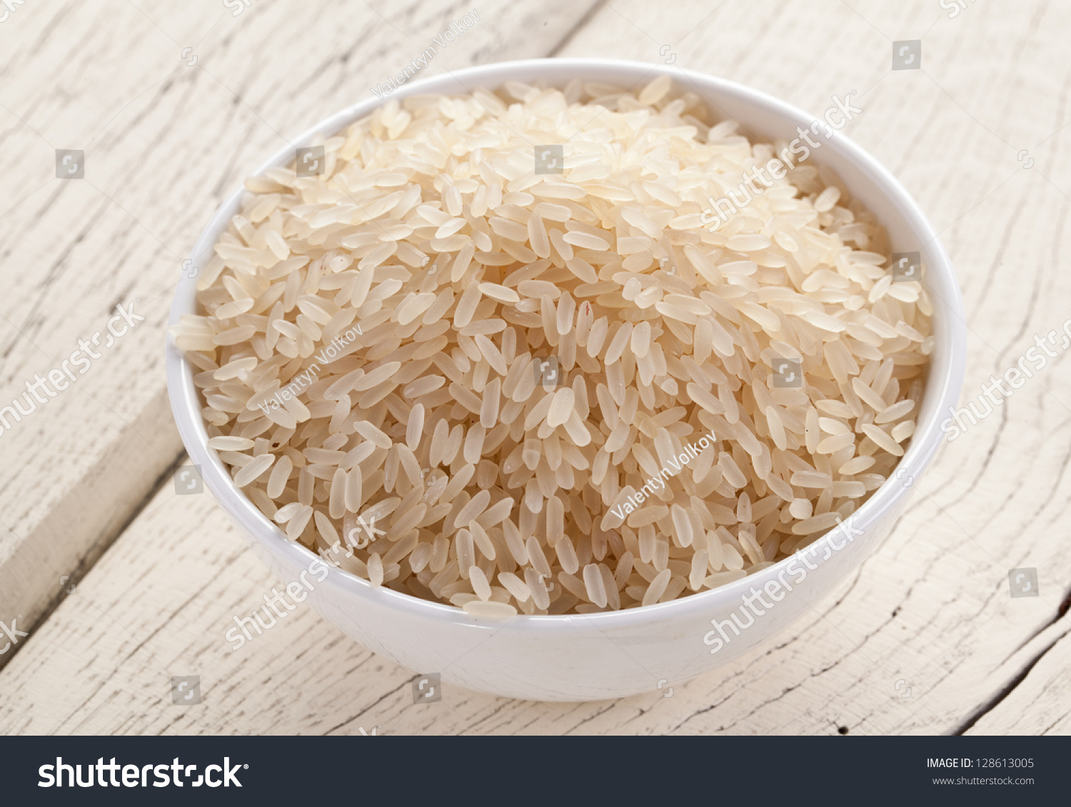 Uncooked Rice Bowl On White Wooden Stock Photo 128613005 - Shutterstock