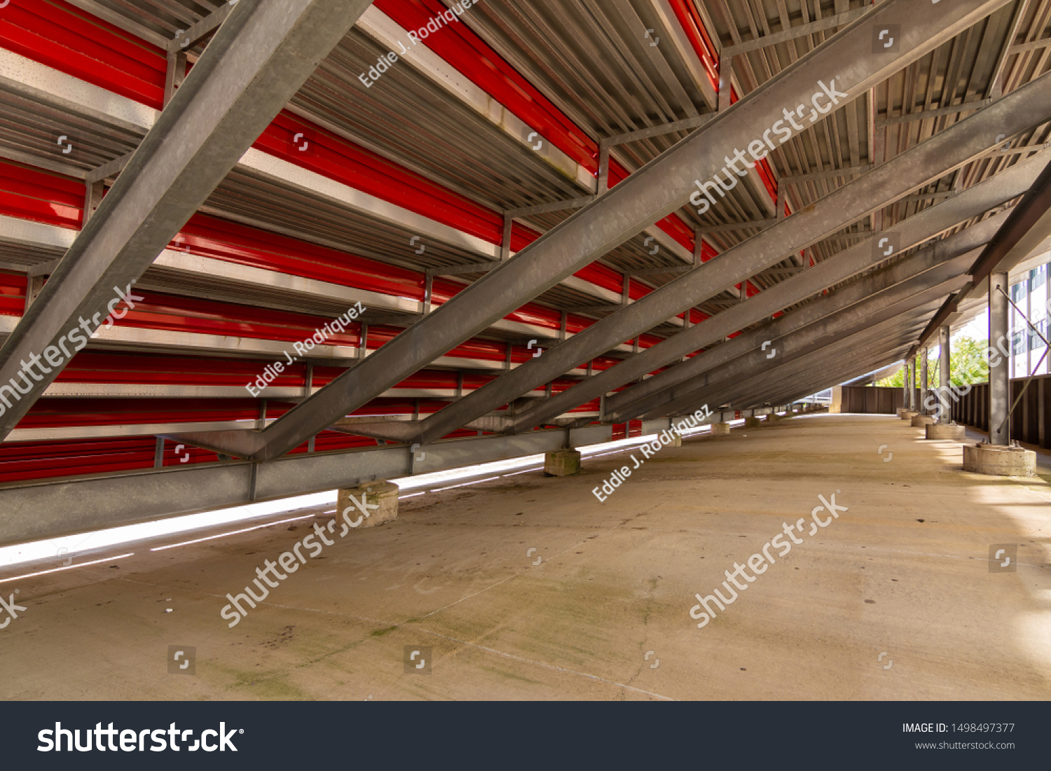 behind bleachers