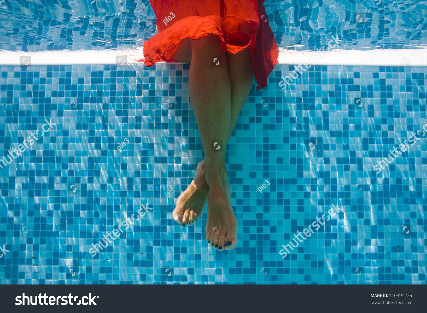 Underwater Woman Feet With Red Dress In Swimming Pool. Stock Photo ...