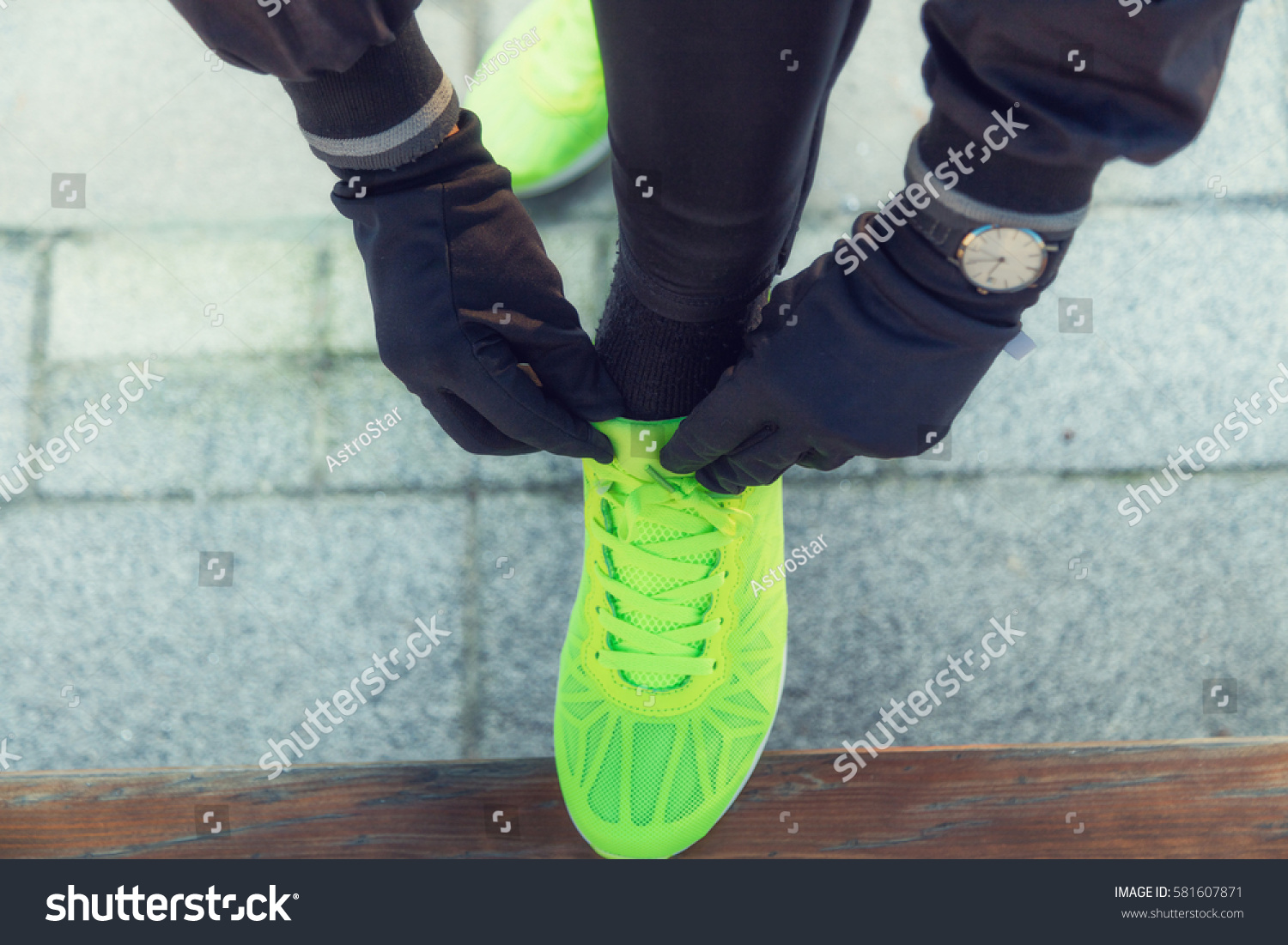 Urban Jogger Tying Running Shoes Park 