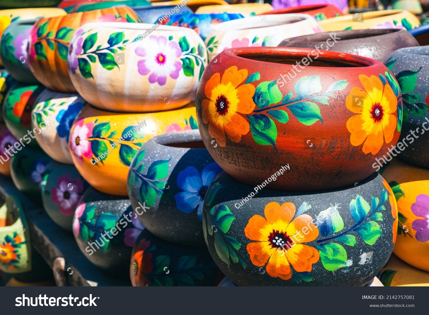 Variety Colorfully Mexican Painted Ceramic Pots Stock Photo 2142757081   Stock Photo Variety Of Colorfully Mexican Painted Ceramic Pots In An Outdoor Shopping Souvenir Market In Mexico 2142757081 