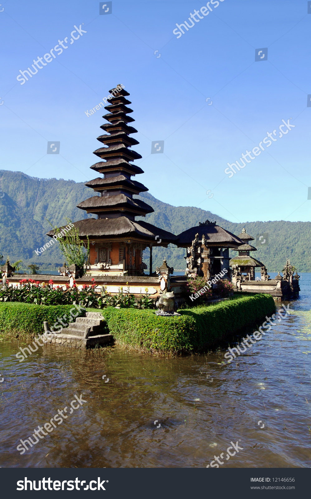 Vertical View Of Picturesque Balinese Temple On Lake In Extinct Volcano ...