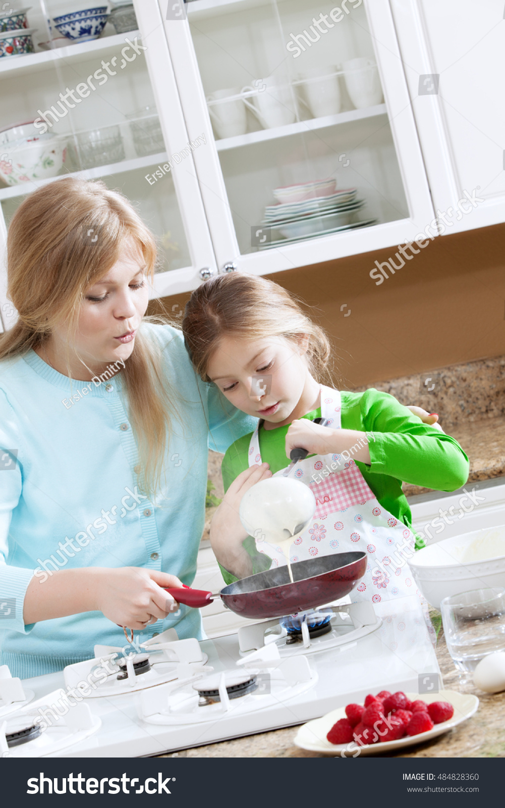 View Young Beautiful Girl Cooking Kitchen Stock Photo (Edit Now) 484828360