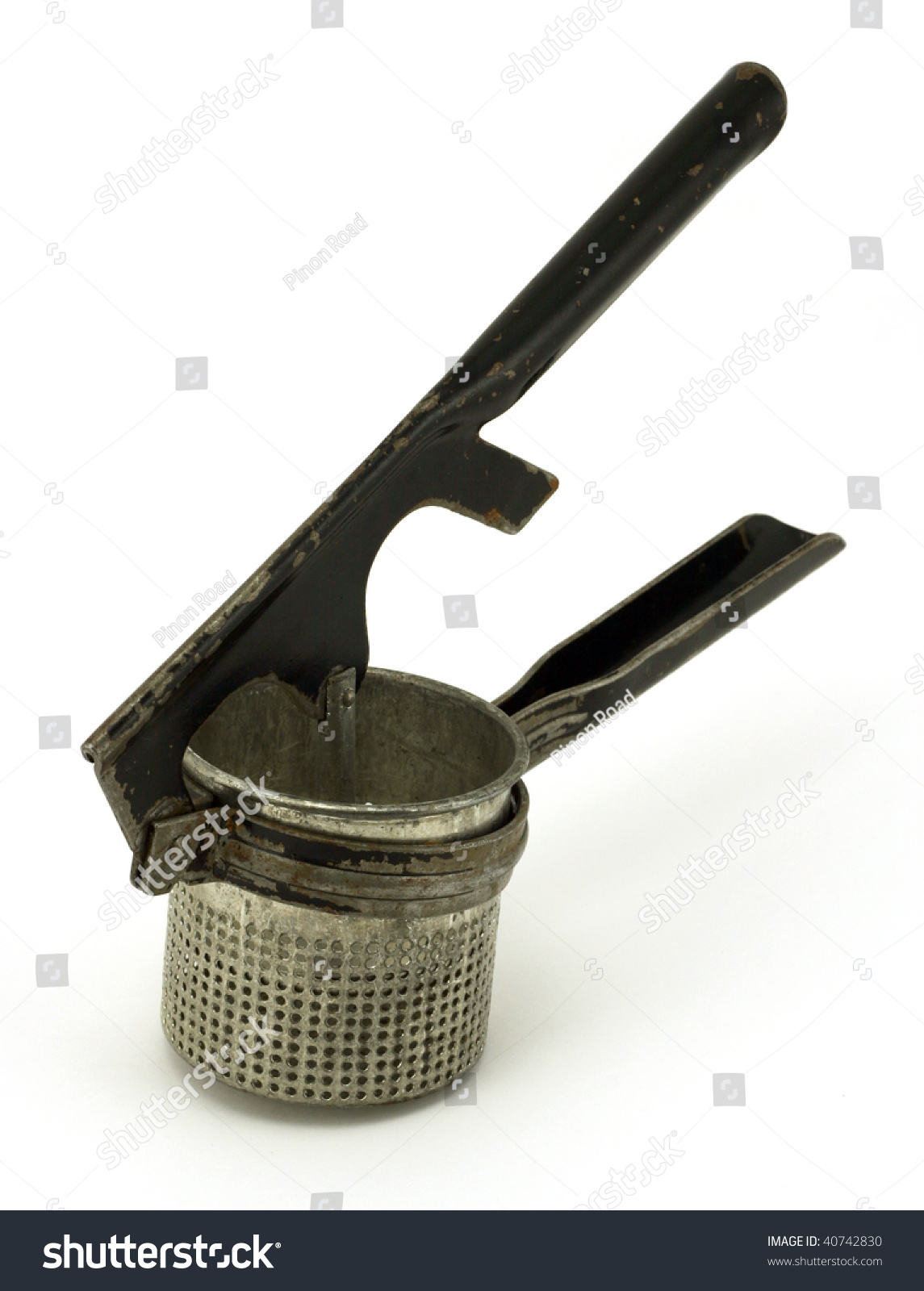 vintage potato masher ricer