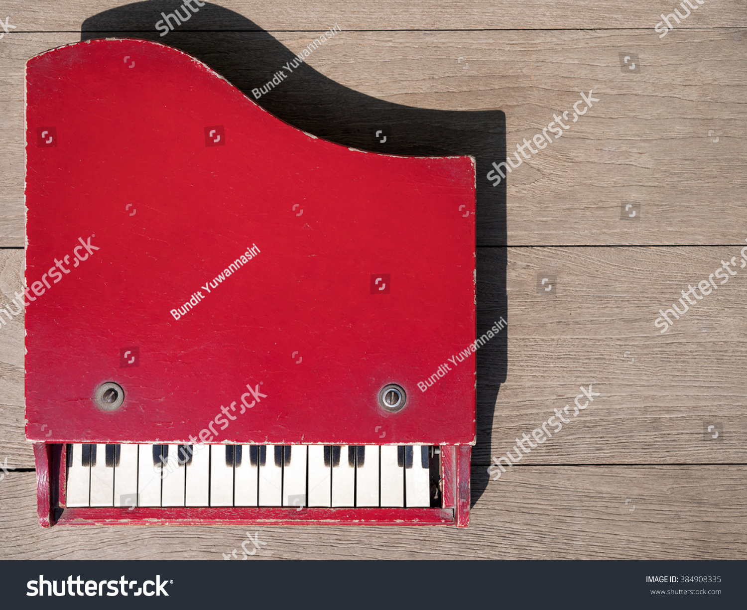 vintage wooden toy piano