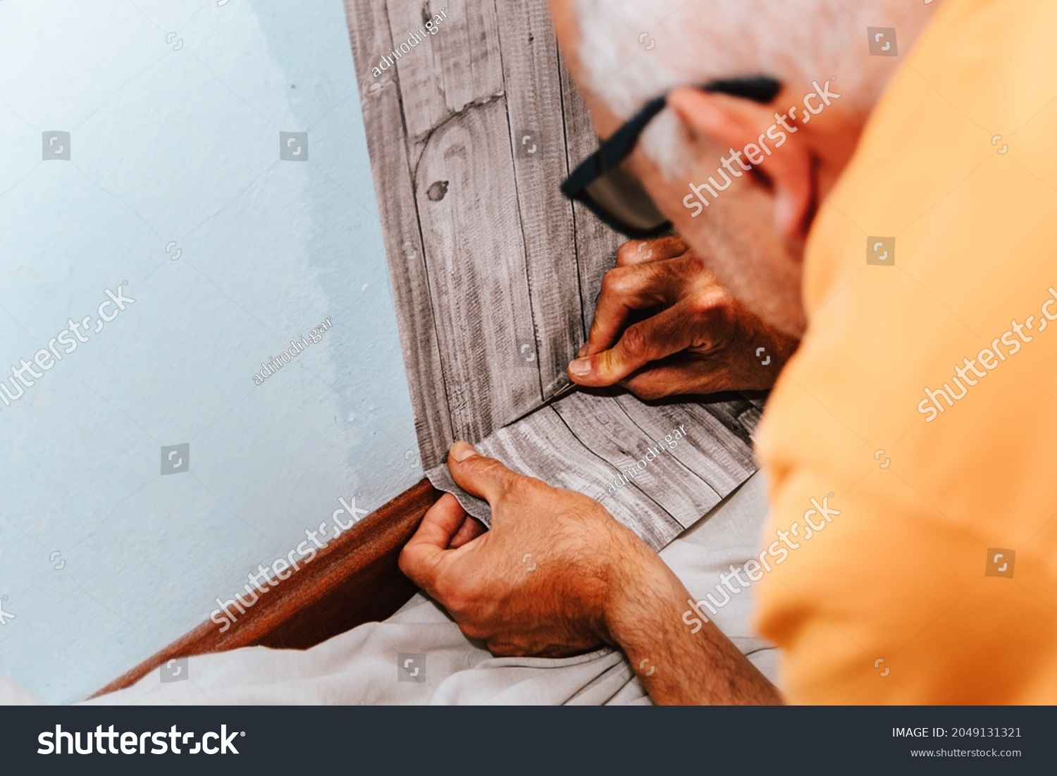 1 369 Im Genes De Vinyl Glue Im Genes Fotos Y Vectores De Stock   Stock Photo  Ing A Man Glues Gray Vinyl   On A Non Woven Backing Renovation Of The Room Hang 2049131321 