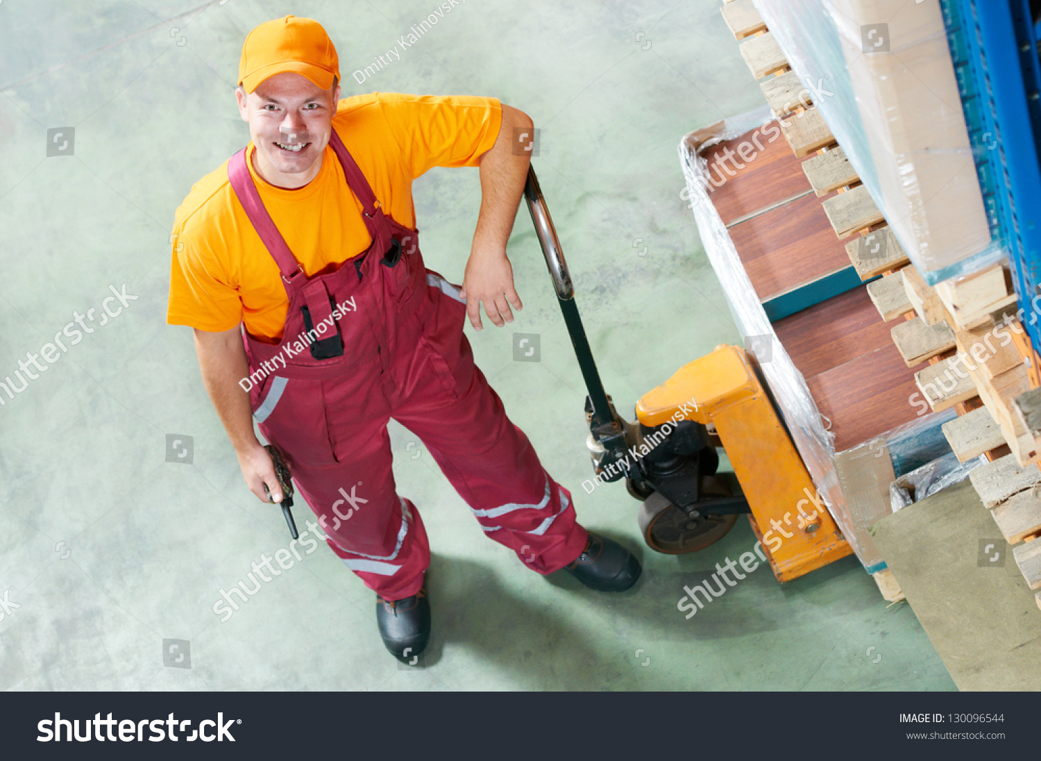 Warehouse Worker Fork Pallet Truck Stacker Stock Photo 130096544