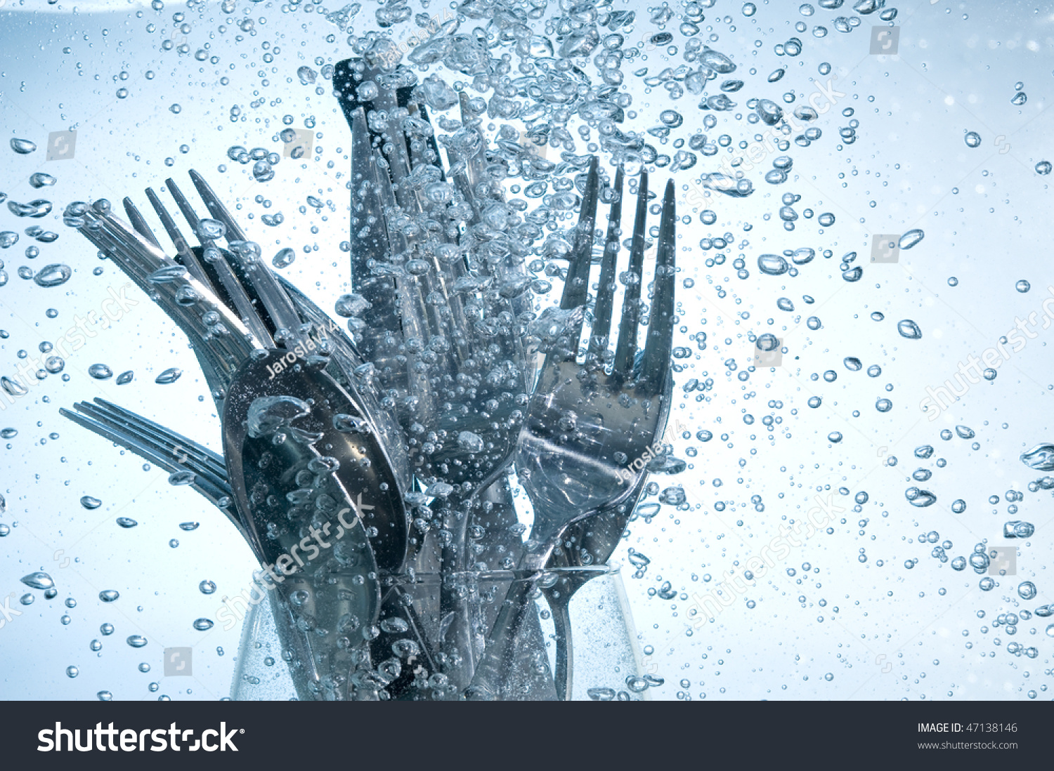 Washing Kitchen Ware In Clear Water On Bubbles Background Stock Photo ...