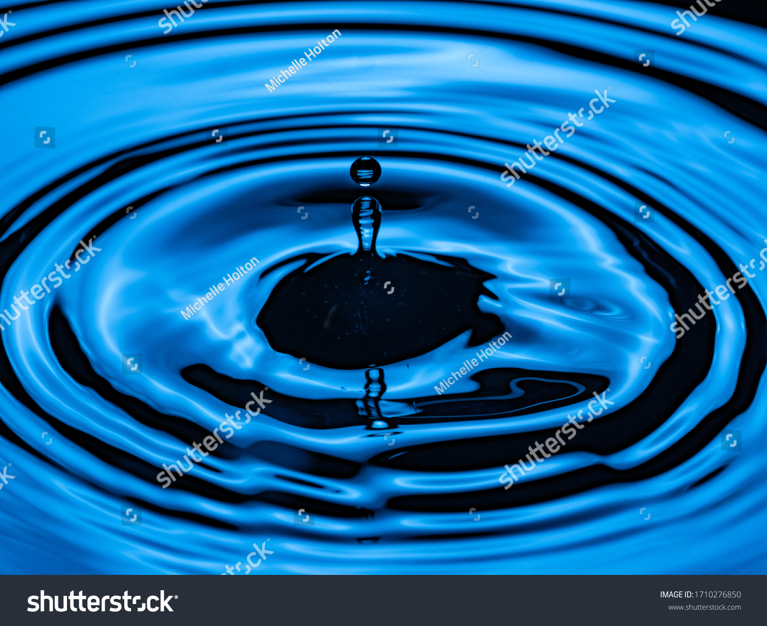 Water Droplet Dripping Into Pool Creating Stock Photo 1710276850 ...