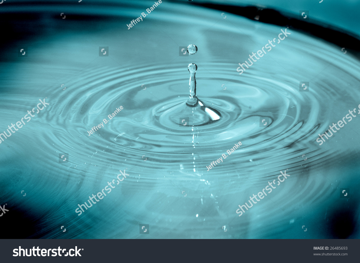 Water Droplets After Striking The Surface Of A Pond Stock Photo ...