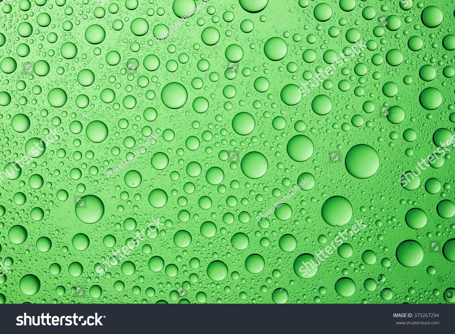 Water Drops On Green Glass Surface Stock Photo 373267294 - Shutterstock