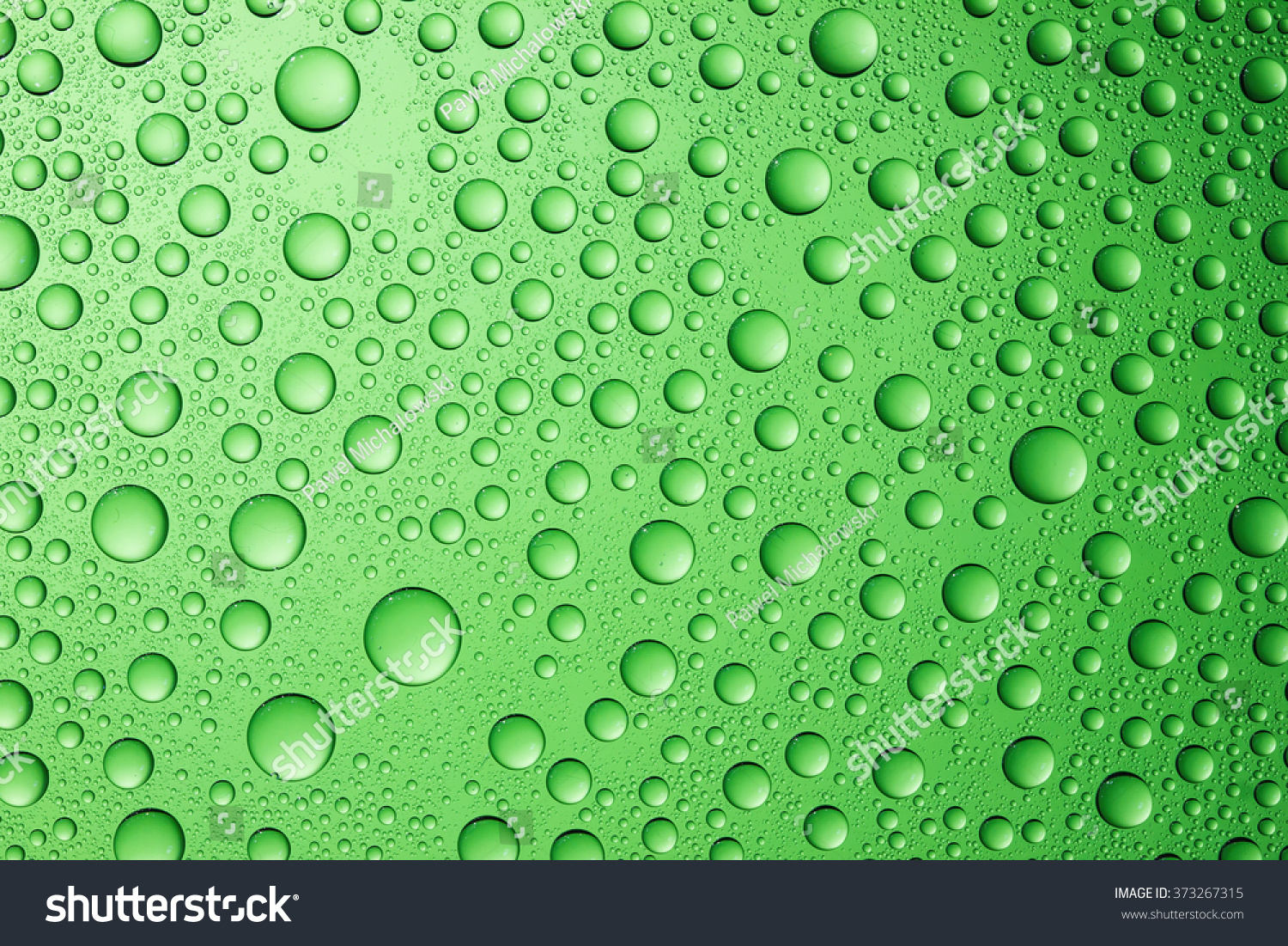 Water Drops On Green Glass Surface Stock Photo 373267315 - Shutterstock