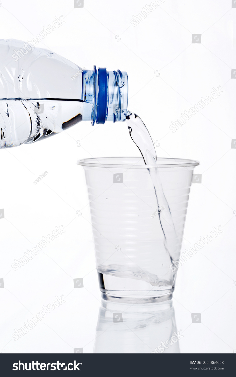 Water Poured From The Bottle To The Plastic Disposable Cup Stock Photo ...