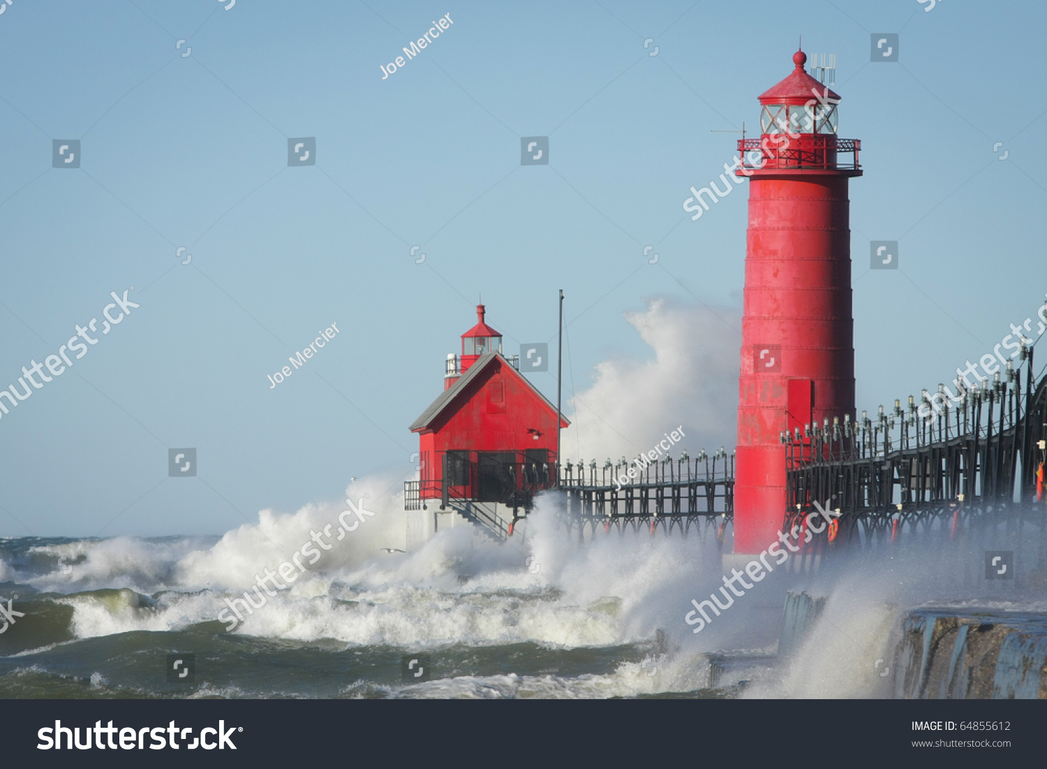 Waves Crashing On Lighthouse. Grand Haven Lighthouse On Lake Michigan ...