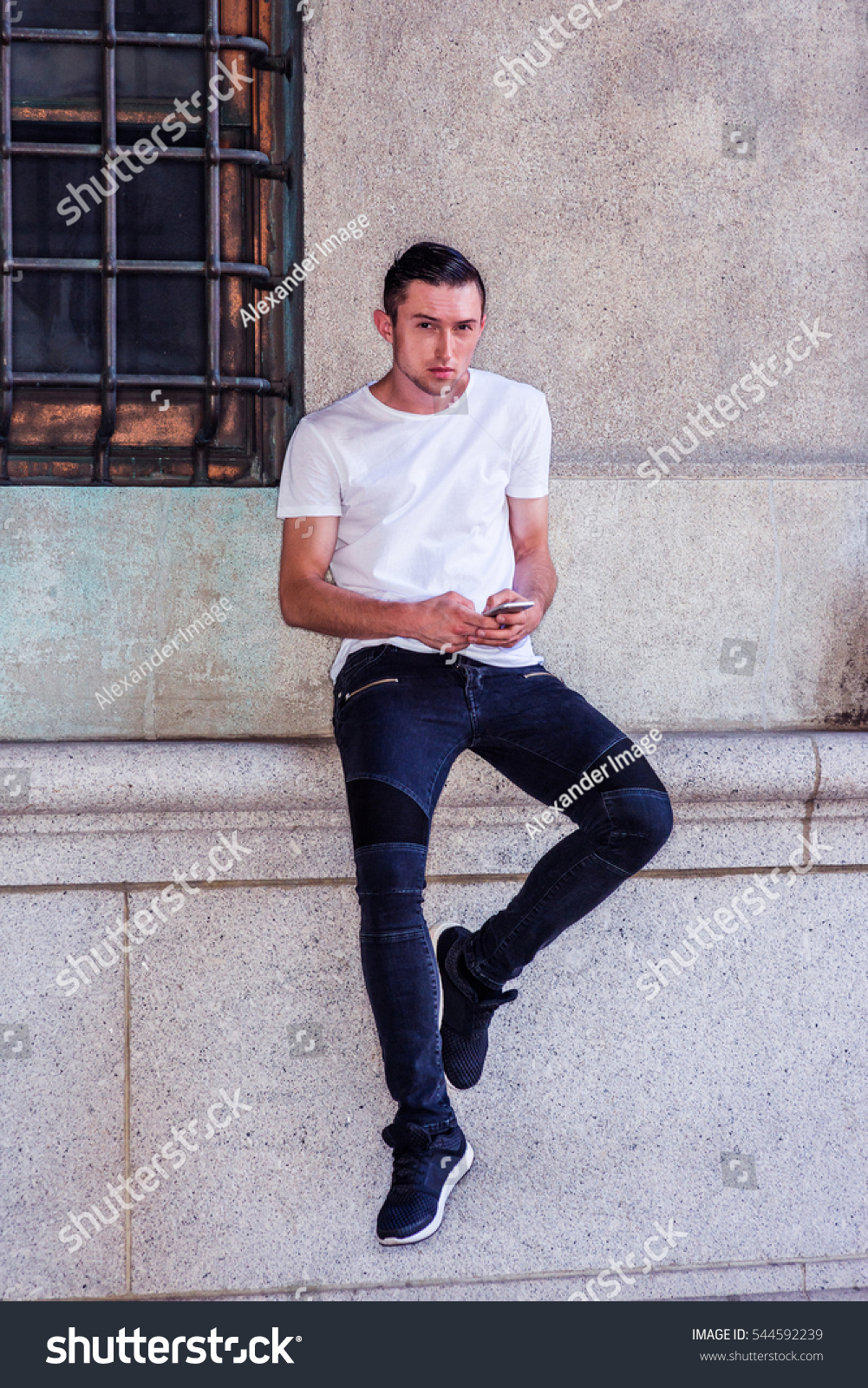 white shirt and black jeans