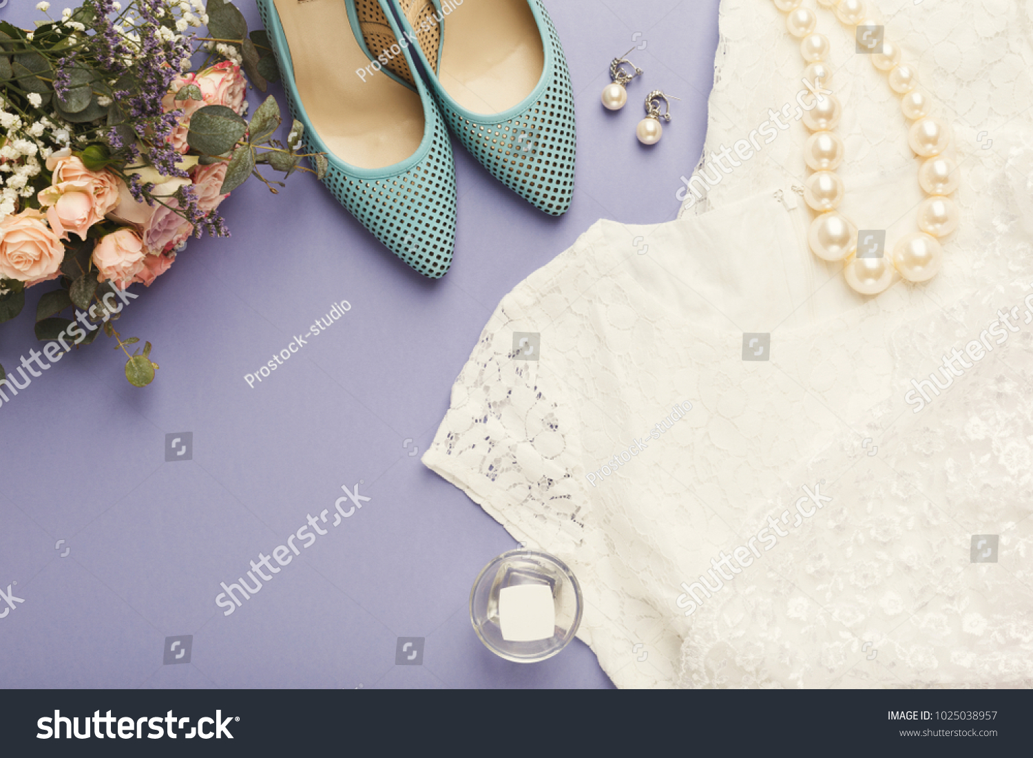 white dress with purple accessories