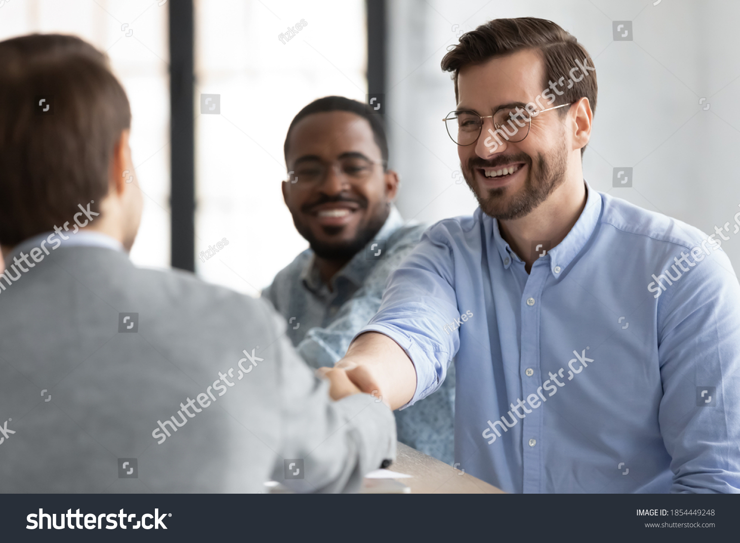 Welcome Team Two Friendly Smiling Male Stock Photo (Edit Now) 1854449248