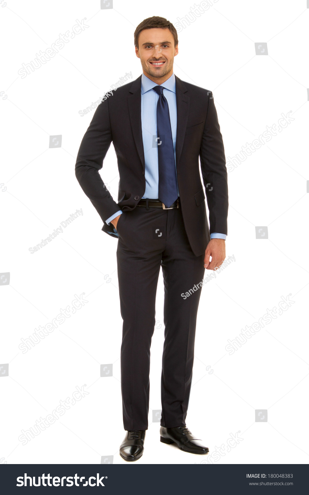 Well-Dressed Man In Suit And Tie. Charismatic Businessman Standing On ...