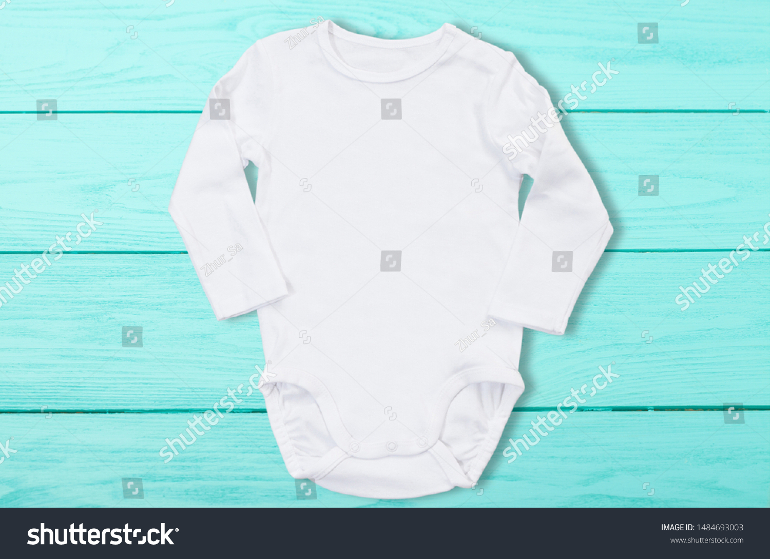 Download White Baby Mock Jumpsuit On Blue Stock Photo Edit Now 1484693003