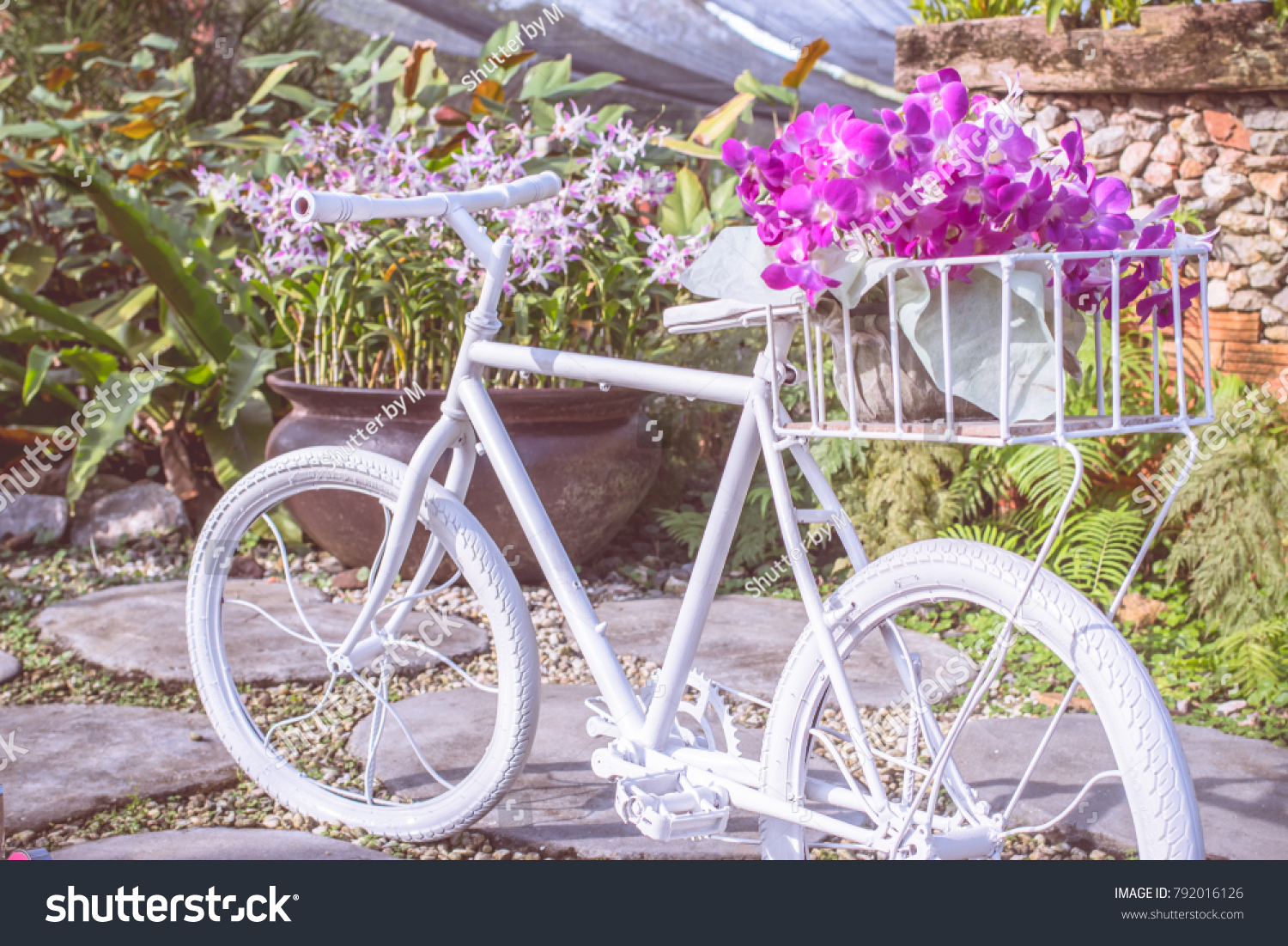 white bike with flowers