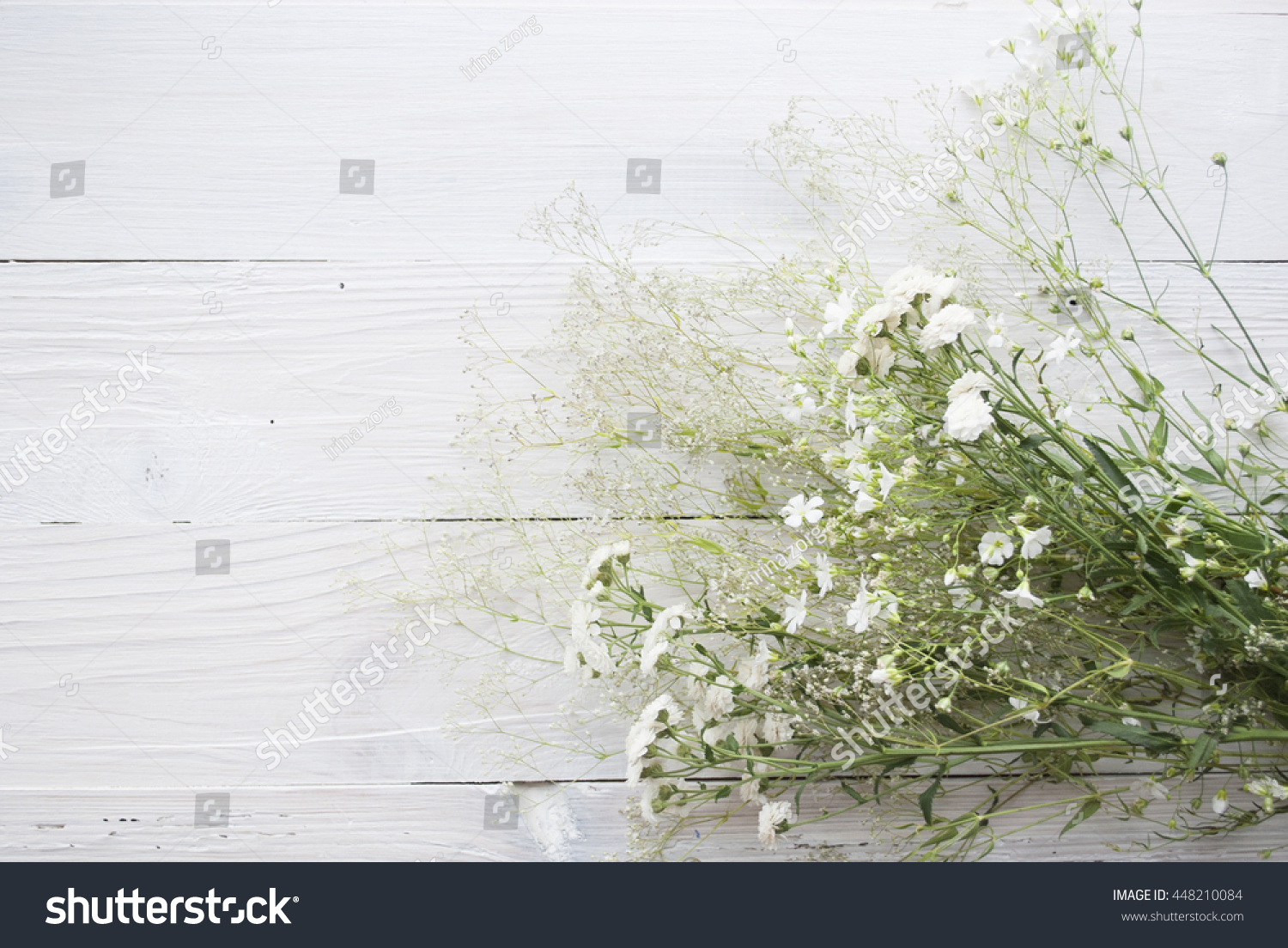 White Flowers On Wooden Background Stock Photo 448210084 - Shutterstock