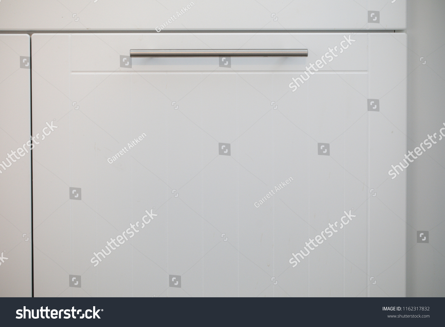 White Kitchen Cabinets Metal Pulls Knobs Stock Photo 1162317832   Stock Photo White Kitchen Cabinets With Metal Pulls Or Knobs On The Doors 1162317832 