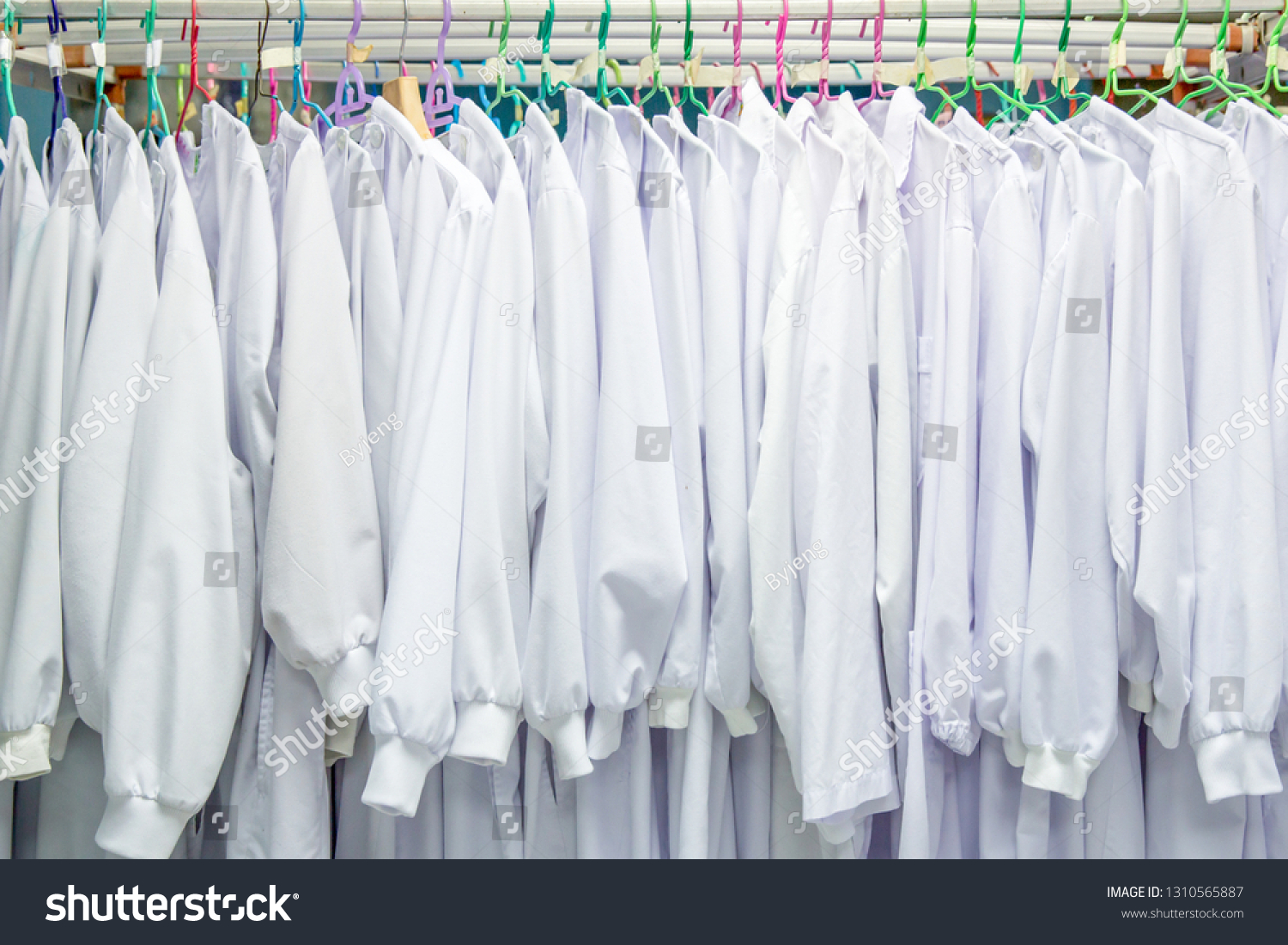 White Medical Uniform Clothes On Hangers Stock Photo 1310565887 ...