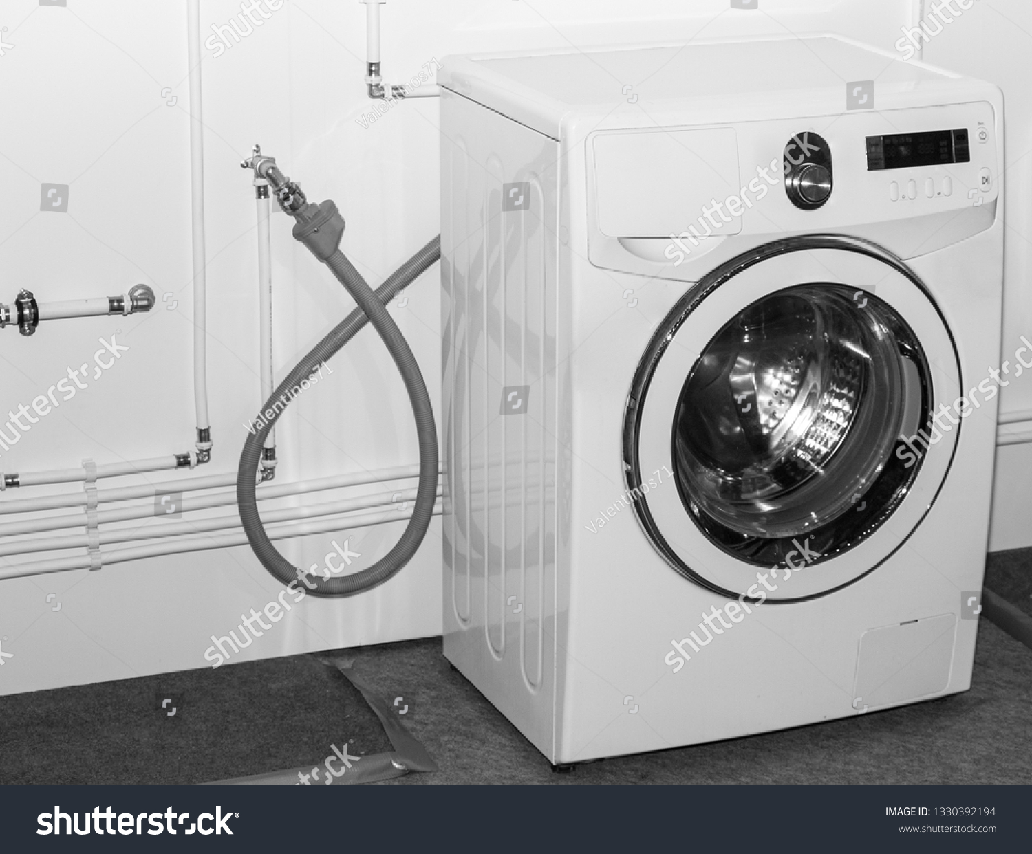 Stock Photo White Washing Machine Connected To Water Pipes 1330392194 