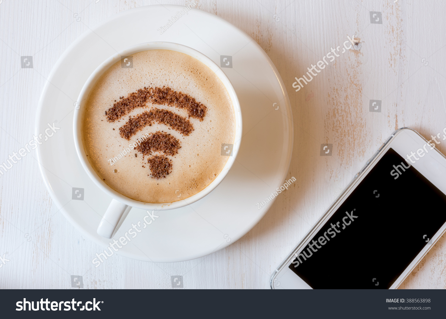 カプチーノのコーヒーデコレーションとして シナモンで作られたwifiシンボル の写真素材 今すぐ編集