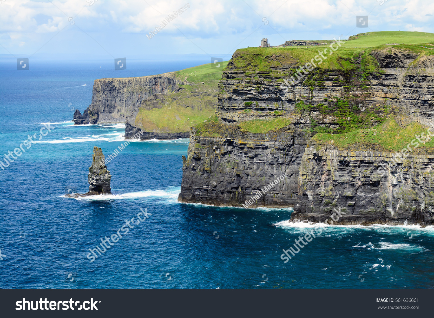 stock photo wild cliffs of moher and o brien s tower ireland 561636661