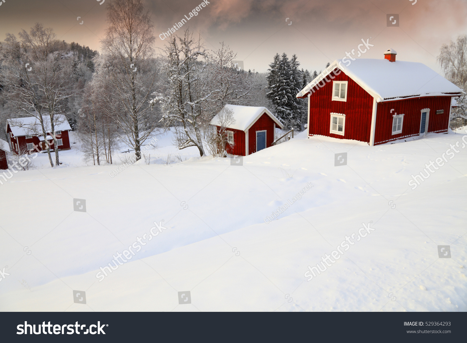 Winter Landscape With Old Rural Cottages In Sweden
