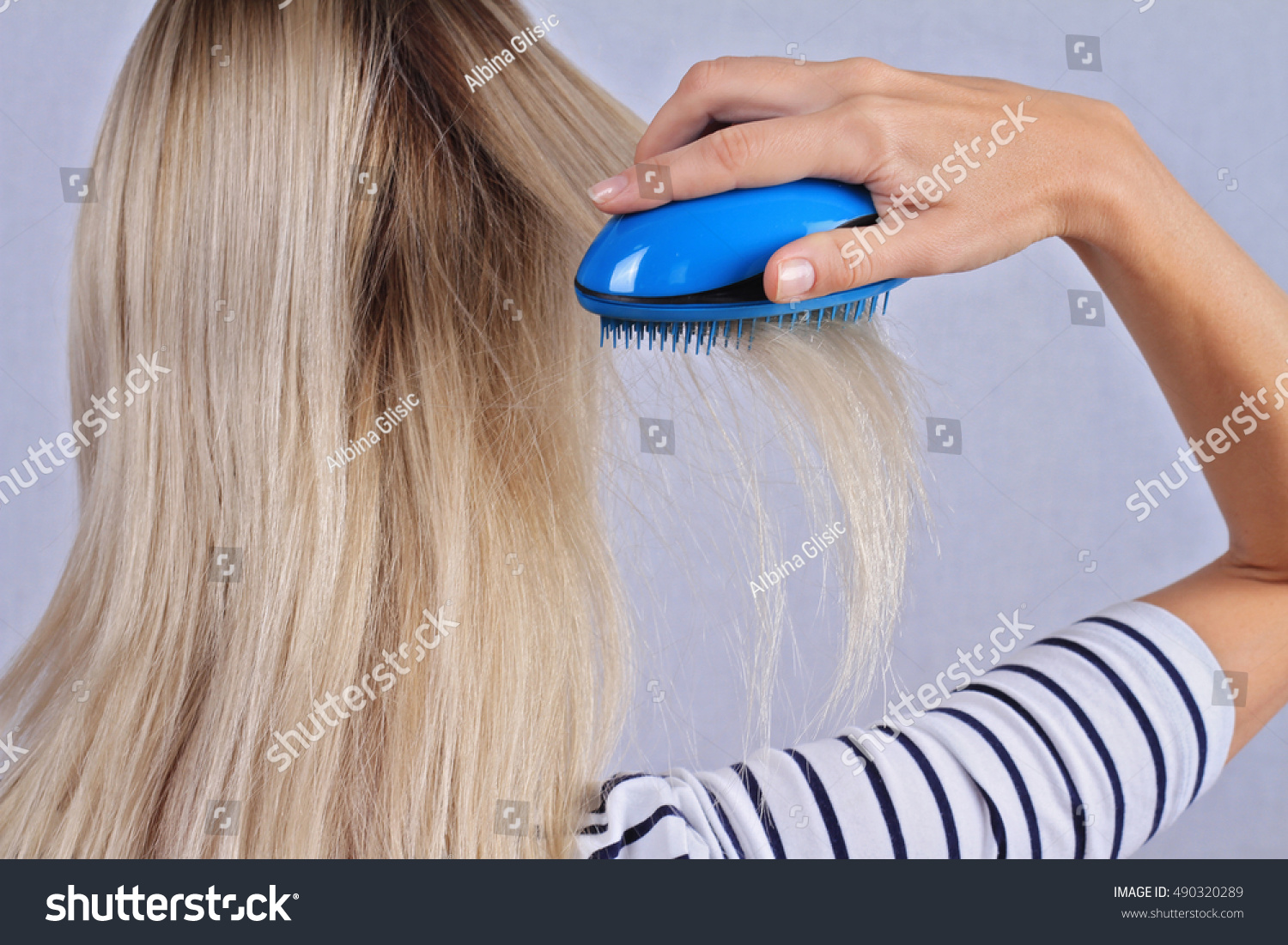 Woman Brushing Her Hair Thin Damaged Stock Photo Edit Now 490320289