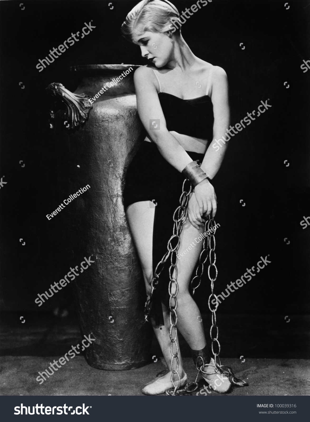 Woman Chained In Front Of A Big Vase Stock Photo 100039316 : Shutterstock